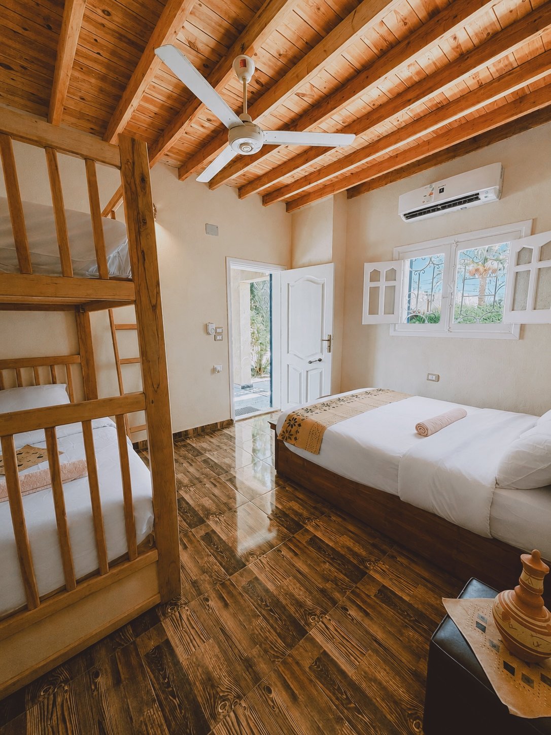 Family room with double bed and bunk bed